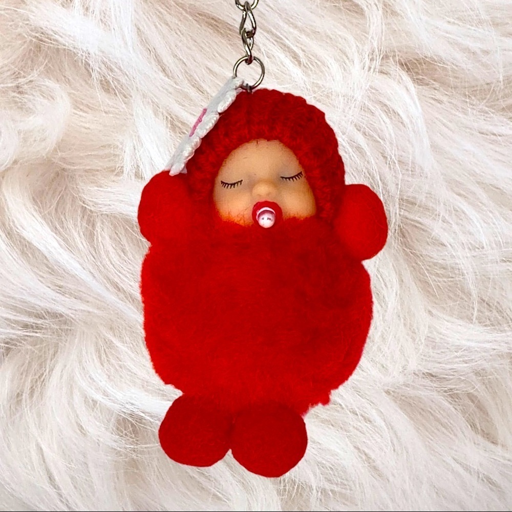 SLEEPY BABY WITH PACIFIER SMALL POMPON IN RED KEYCHAIN CHARM‎